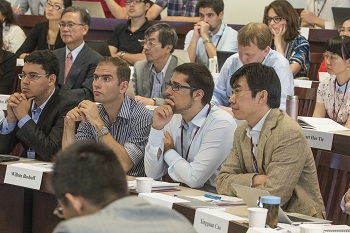 Summer Institute scholars listen during class