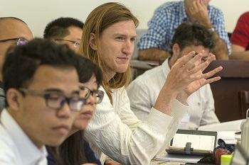 A Summer Institute scholar speaks in class