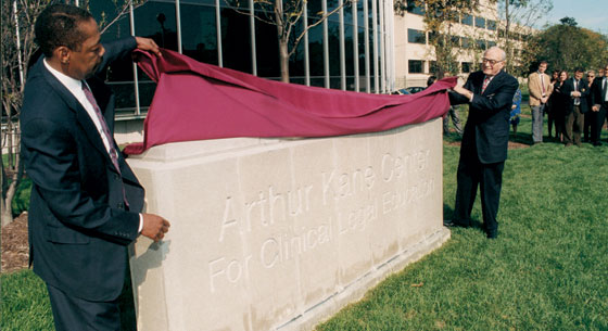 Randolph Stone and Arthur Kane unveil the new marker for the building.