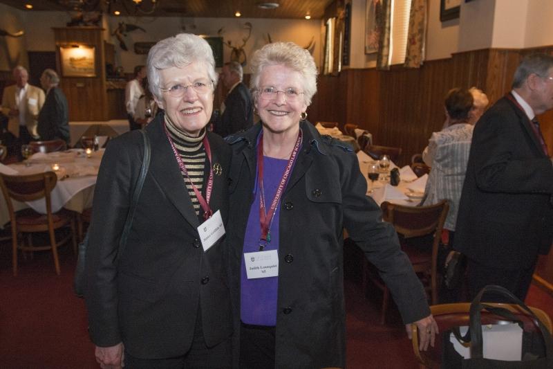 Janice Griffith and Judith Lonnquist, both '65, catch up at their Reunion Class Dinner.