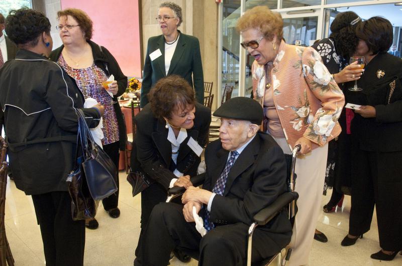 John W. Rogers Sr., '48, greets his family and friends. 
