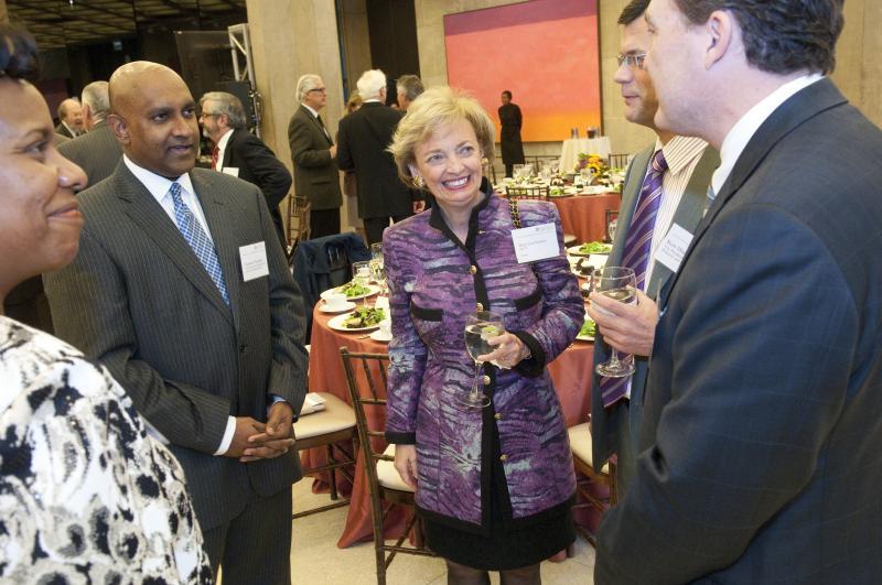 Trustee Mary Lou Gorno, MBA '76, chats with other guests. 