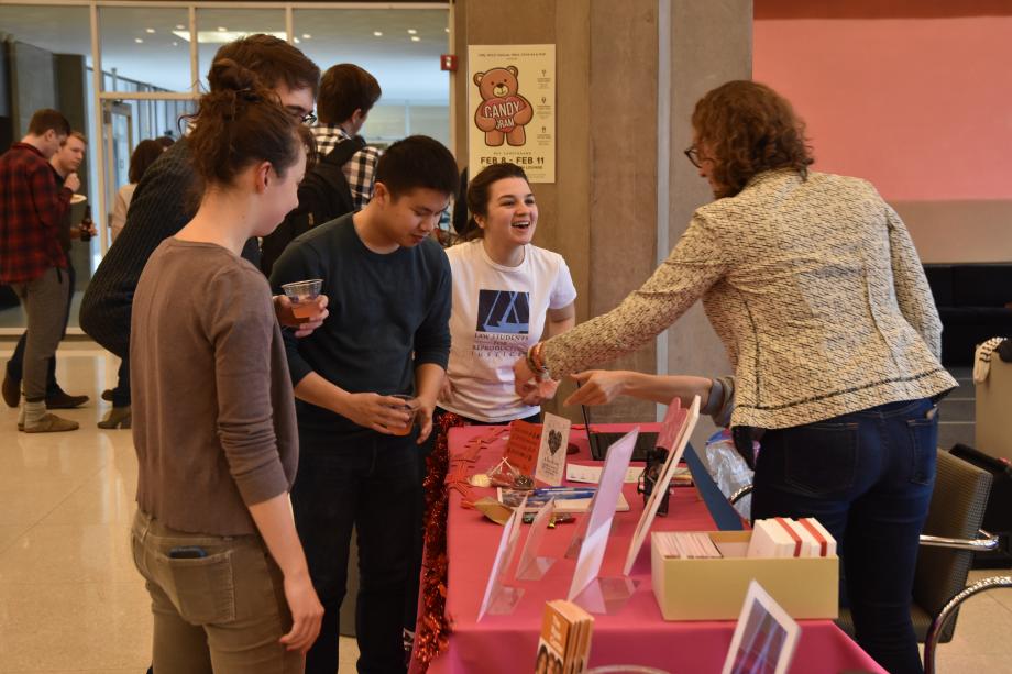 Members of LSRJ at a table in the Green Lounge