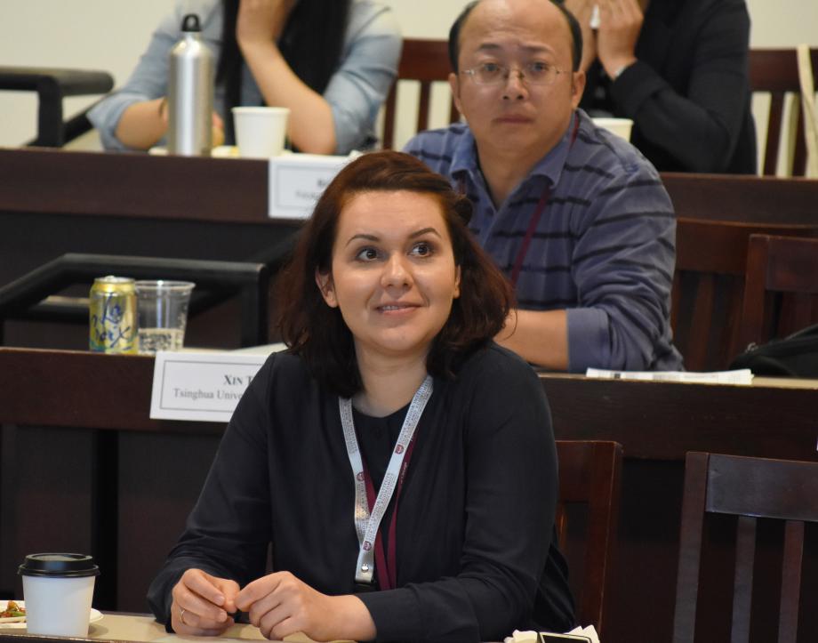 An international scholar listens attentively