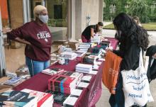 Students shopping for course books outside the Law School