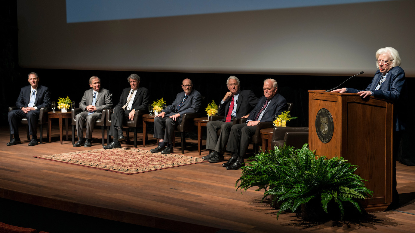 Kenneth Dam (seated second from right) served as provost during the tenure of President Hanna Holborn Gray (right). He is pictured in 2012 alongside predecessors and successors as provost, Thomas Rosenbaum, Richard Saller, Geoffrey Stone, Norman Bradburn and Edward Laumann (left to right).