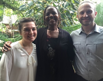 Kaitlin Beck, Netsai Mushonga, and Associate Director Brian Citro pose for the camera