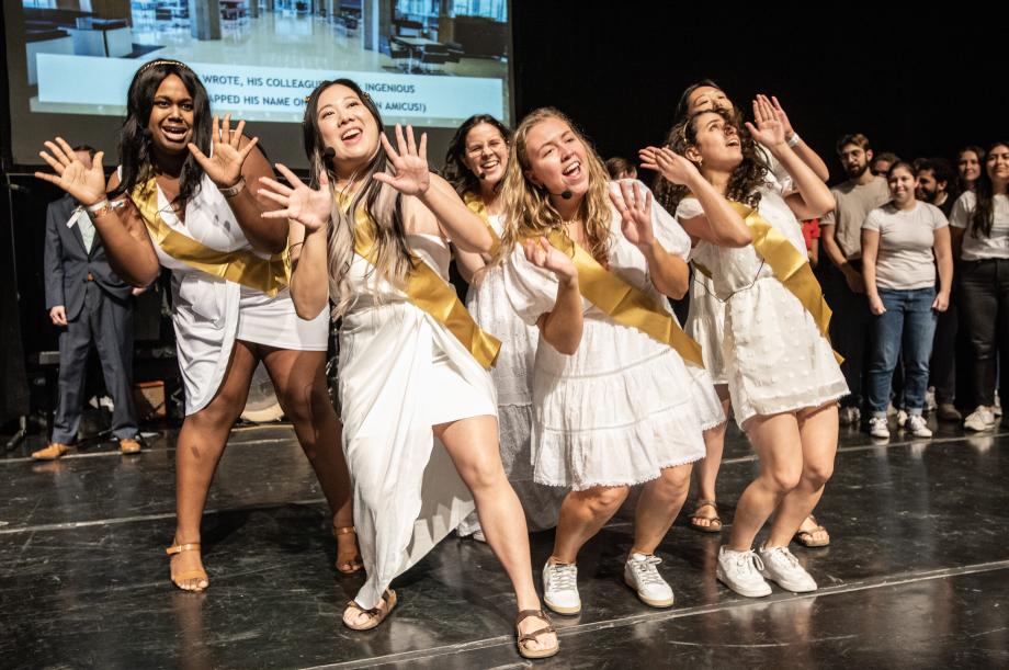 6 Muses doing jazz hands.