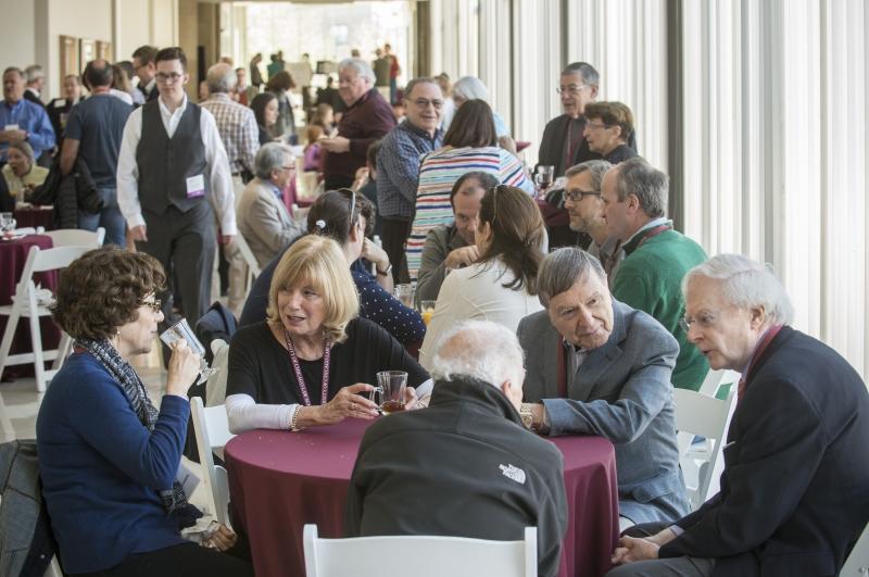 Alumni catch up with classmates at breakfast on Saturday.