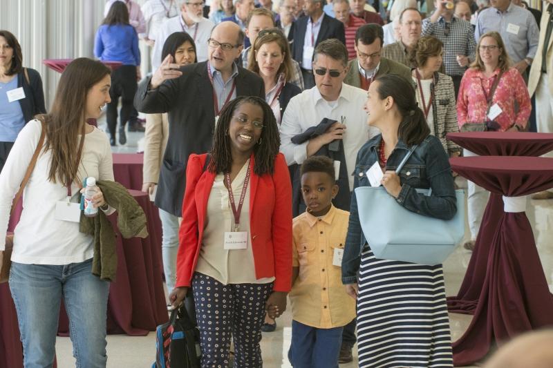 Alumni head to lunch after two morning talks at the Law School.