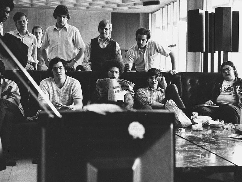 Students here are relaxing in the Green Lounge before its expansion and with its old furniture.