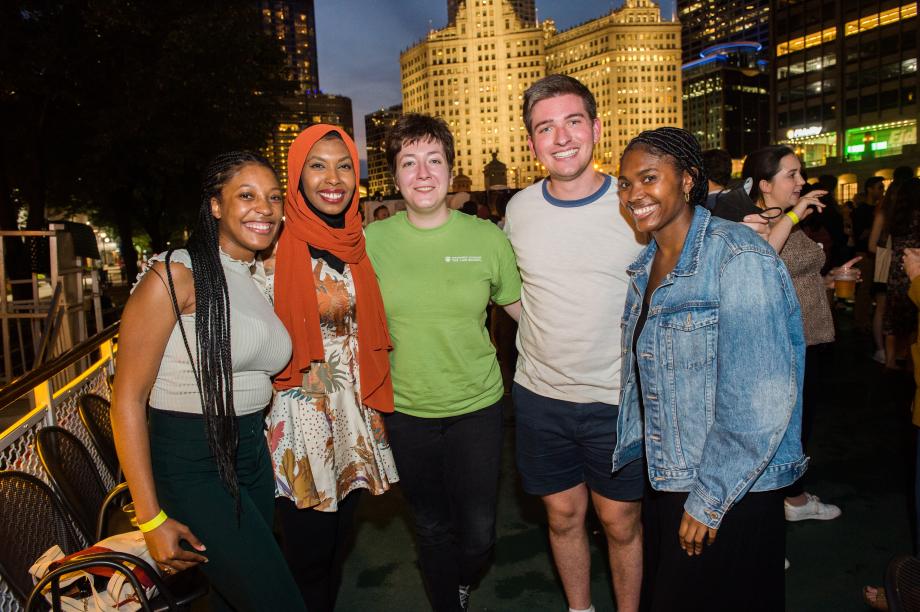 A group of students pose on the river cruise boat.