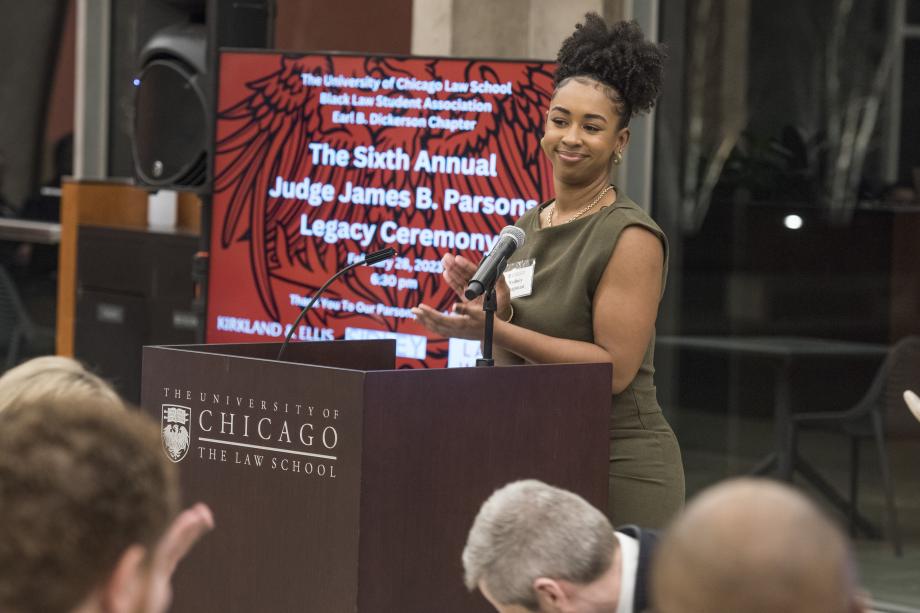 Sydney Chapman speaks from the podium