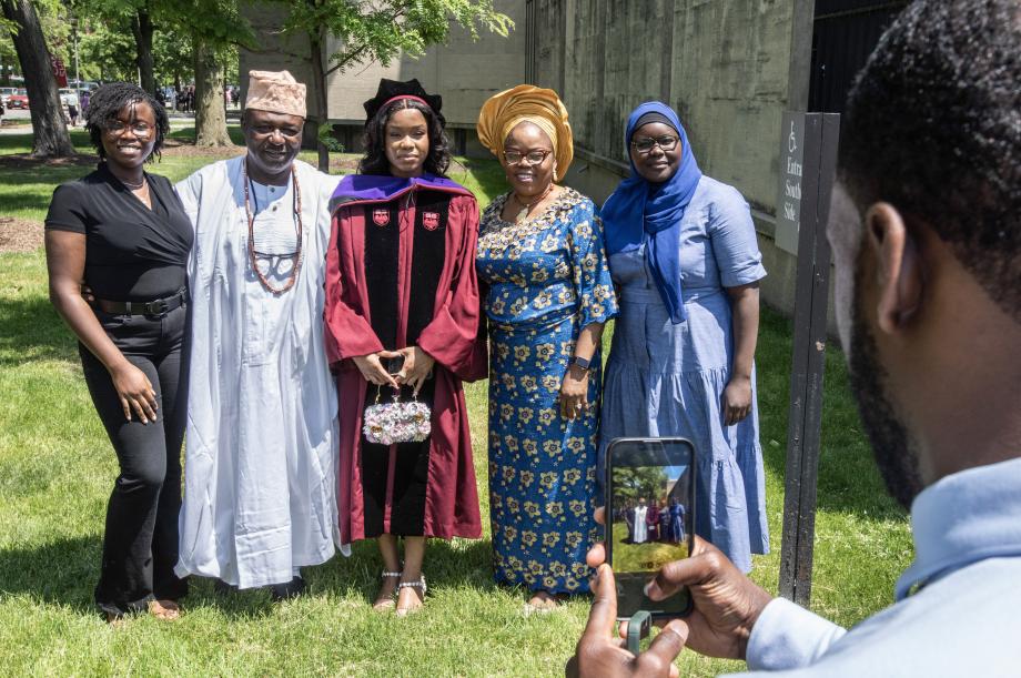 A graduate captures the moment with her family.