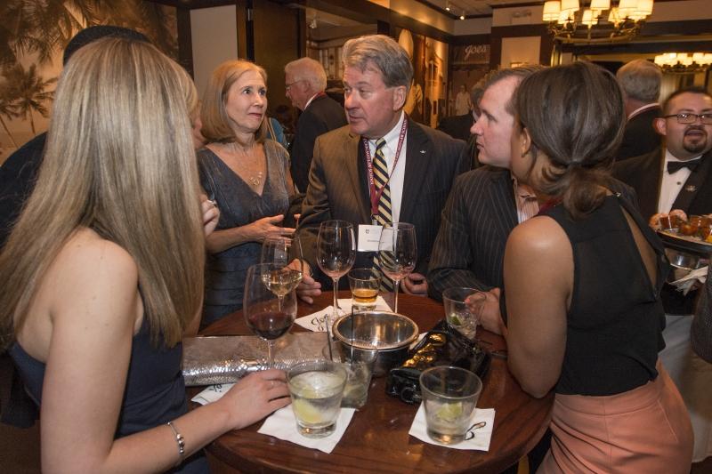 Reunion committee members attended a reception at Joe's Seafood.