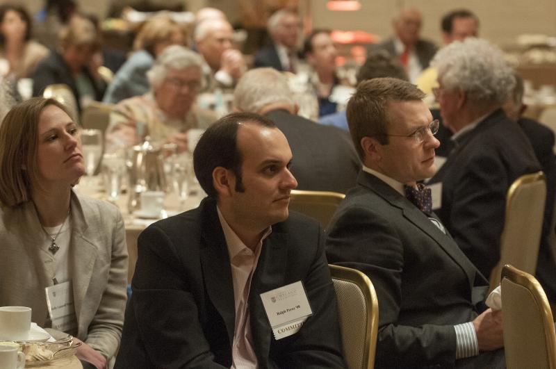 Alumni listen attentively to the Annual Loop Luncheon, featuring Professor Todd Henderson, ‘98