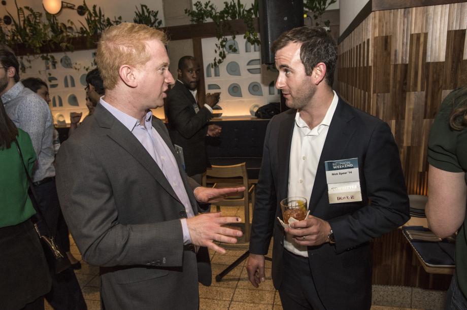 Professor Jonathan Masur talks with Nick Spear, ’14, at the Class of 2014 dinner.
