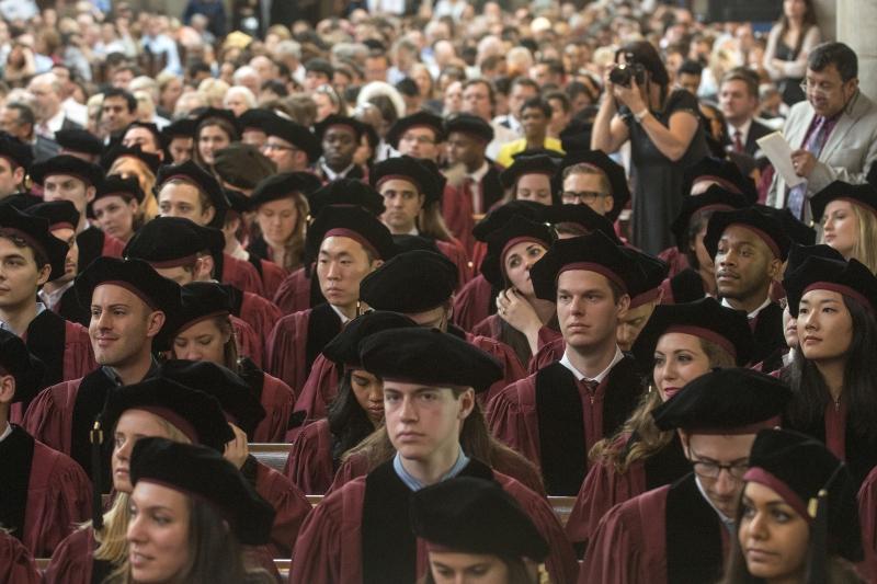 The Class of 2015 awaits receiving their hoods and diplomas. The Class of 2015 awaits receiving their hoods and diplomas.