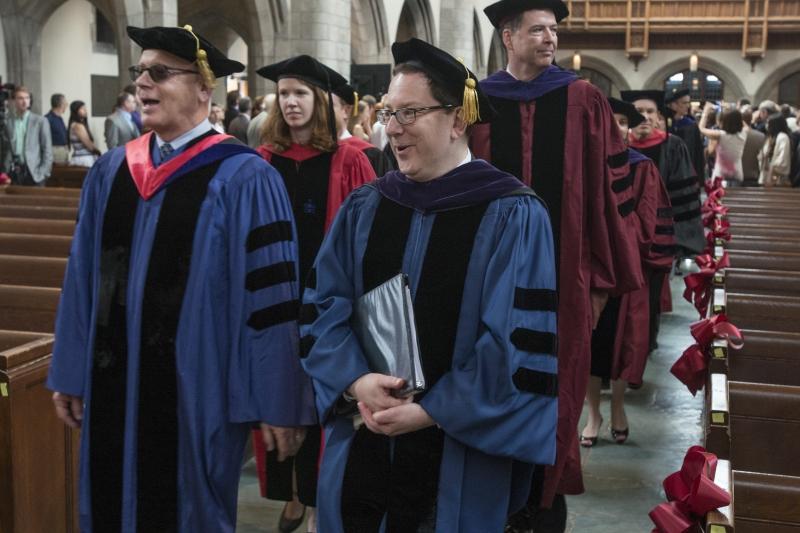 Faculty members begin the procession into Rockefeller Chapel. Faculty members begin the procession into Rockefeller Chapel.