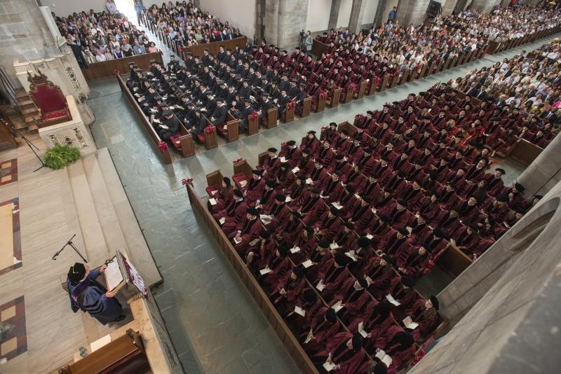 A bird's eye shot of the Diploma & Hooding Ceremony. A bird's eye shot of the Diploma & Hooding Ceremony.