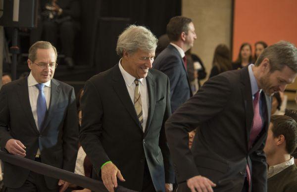 “One of the fundamental characteristics of the Law School culture is the ability of individuals to engage in energetic, serious debate and argument without anyone taking it personally," said Geoffrey Stone, the Edward H. Levi Distinguished Service Professor of Law. He is shown arriving with Douglas Baird, the Harry A. Bigelow Distinguished Service Professor of Law, and Thomas J. Miles, Dean and Clifton R. Musser Professor of Law and Economics.