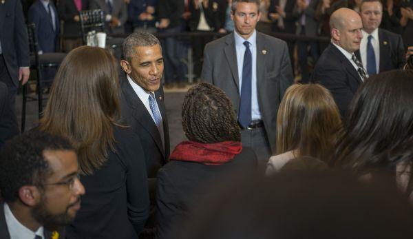 After he finished taking questions, President Barack Obama greeted members of the audience.