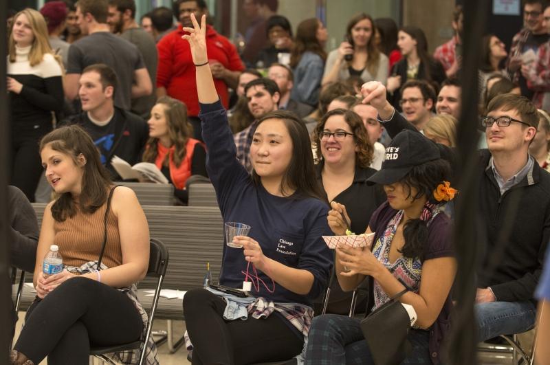 Jamie Lee, '19, places a bid at a key moment in the Auction. 