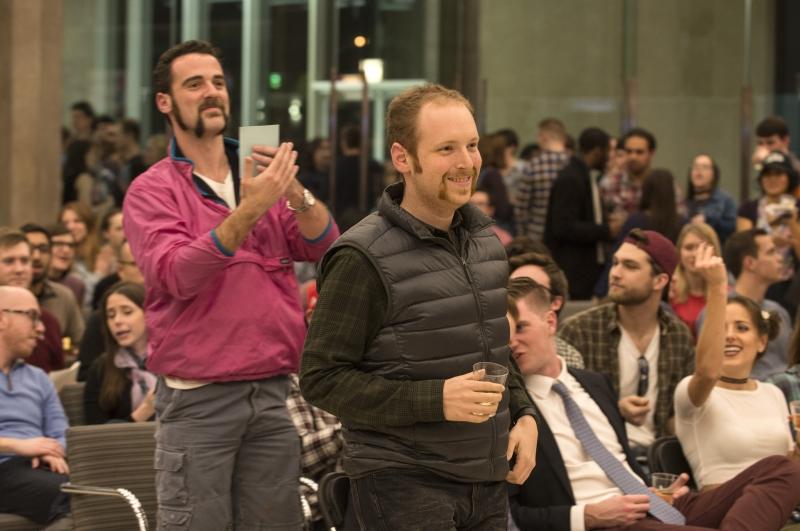 Joe Egozi, '17, third place, congratulates the winner of the Oliver Wendell Holmes mustache contest, Eric Wessan, '19 (right). The contest raised more than $450 for CLF.