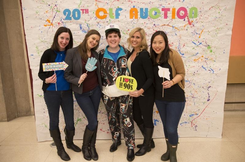 This year's CLF Auction had a 90's theme ("Bid Me Baby One More Time"), which students took to heart in the photo booth. 
