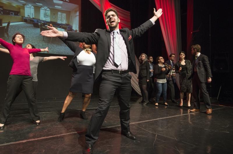 Josh Davids, '18, as Professor John Rappaport, during a fashion "walk off" with a student portraying Professor Nick Stephanopoulos. Josh Davids, '18, as Professor John Rappaport, during a fashion "walk off" with a student portraying Professor Nick Stephanopoulos.