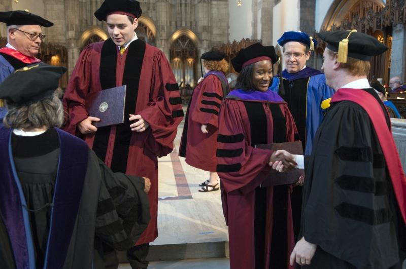 Jonathan Masur, John P. Wilson Professor of Law, and Douglas Baird, Harry A. Bigelow Distinguished Service Professor of Law, also hooded graduates.