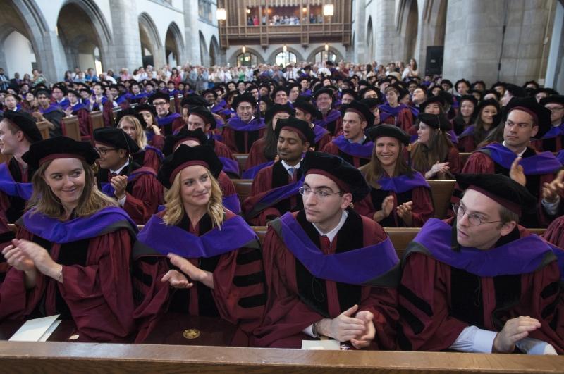 The Class of 2017 applauded in their hoods after the ceremony. The Class of 2017 applauded in their hoods after the ceremony.