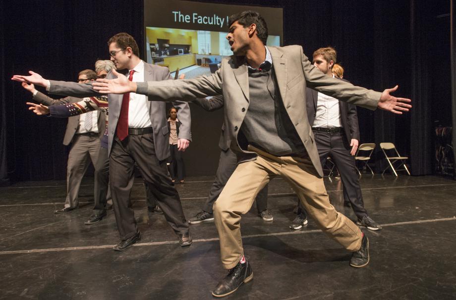 Rahul Srinivas, '19, dressed as Professor Daniel Hemel, leads the male professors in a Backstreet Boys number. 