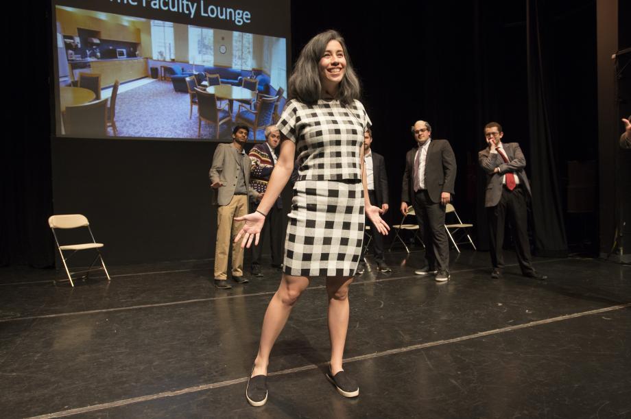 Zoe Kam, '18, as Professor Emily Buss, participates in a song battle with the male professors. Zoe Kam, '18, as Professor Emily Buss, participates in a song battle with the male professors.