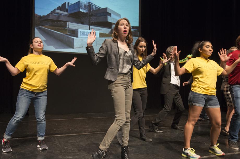 Rachel Kubasak, '19, playing Assistant Director of Student Affairs Candace Bergeron, dances to a parody of Britney Spears' "Toxic" that is titled "Kapnick." Rachel Kubasak, '19, as Assistant Director of Student Affairs Candace Bergeron, dances to a parody of Britney Spears' "Toxic," titled, "Kapnick."Rachel Kubasak, '19, dressed as Assistant Director of Student Affairs Candace Bergeron, dances to a parody of Britney Spears' "Toxic" that is titled "Kapnick."