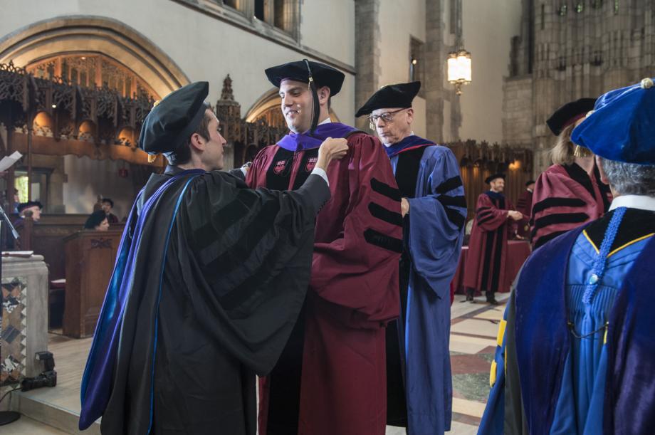Daniel Hemel, Assistant Professor of Law, and Saul Levmore, William B. Graham Distinguished Service Professor of Law, also hooded graduates.