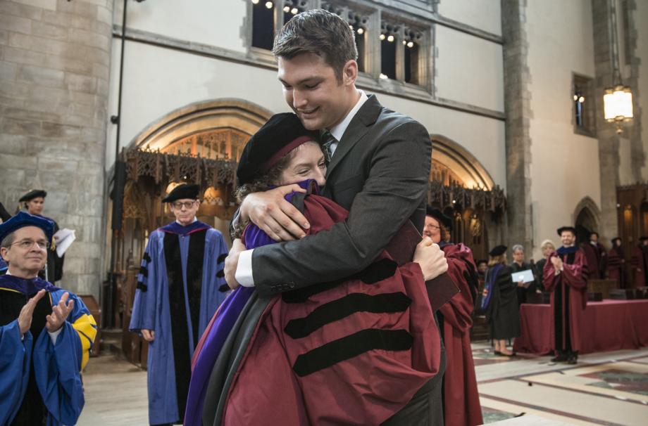 Jandi Heagen, '18, was hooded by her husband Joshua Wilson, '17.