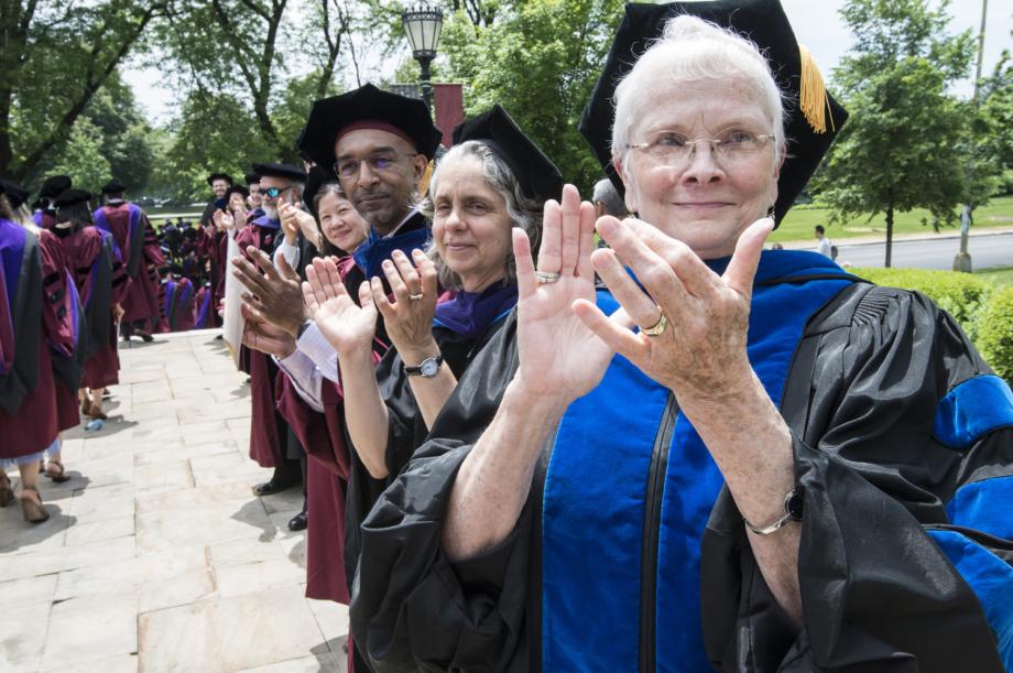 Faculty and senior administrators congratulated the Class of 2018 as they marched out of the chapel.