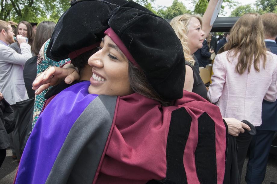 Classmates congratulated each other before making their way to the Law School's reception.