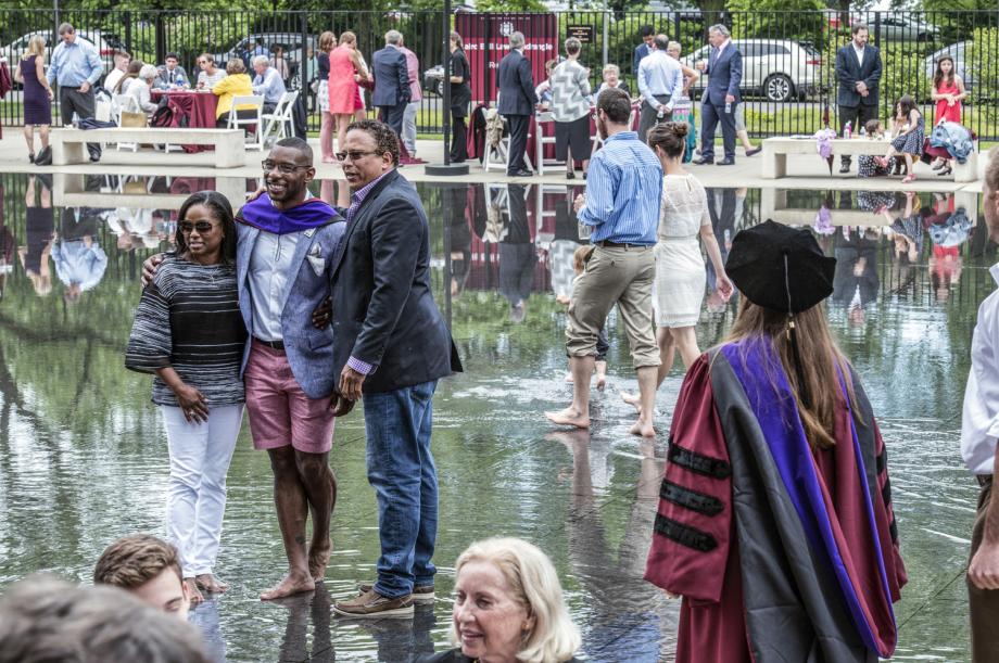 Back at the Law School, graduates celebrated with their families and friends and cooled off in the Levin Reflecting Pool.