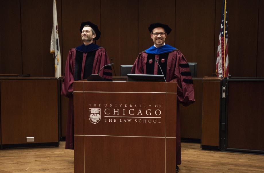 Todd (right) at a 2019 graduation event with Dean Thomas J. Miles.
