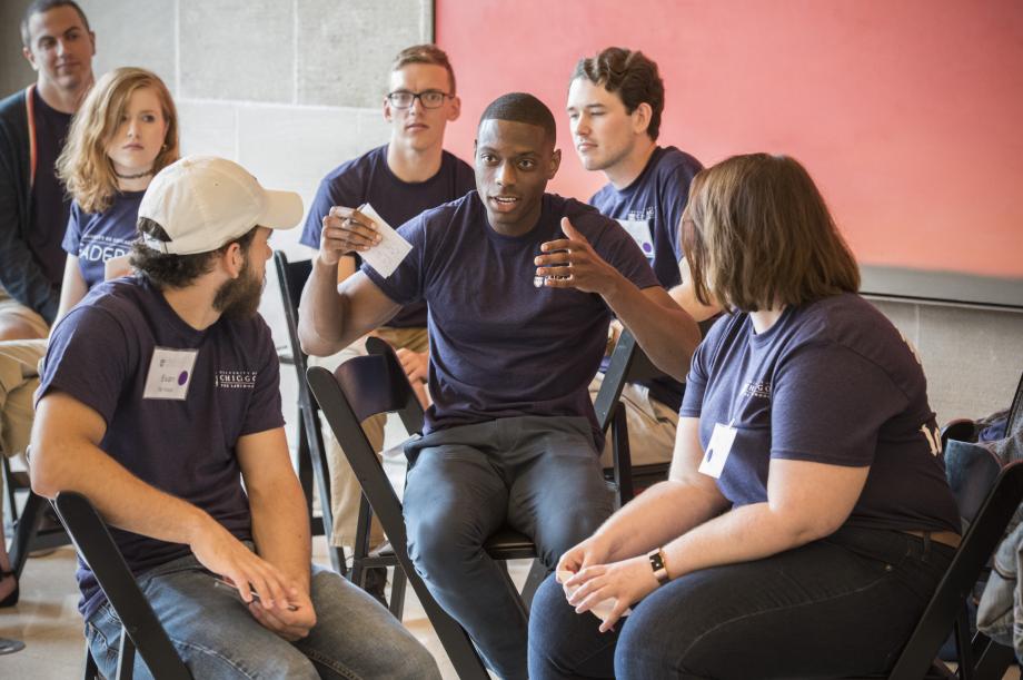 A student speaking with classmates