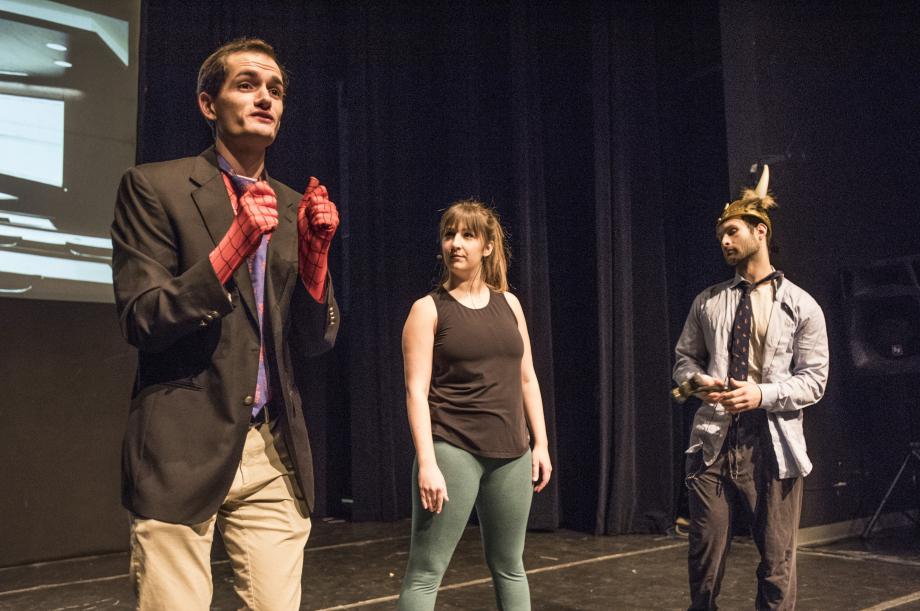 In this scene, Spider-Hemel (played by Chris Hurley, '19), Green Intern (played by Allie Van Dine, '20), and RappaThor (played by Seth Cohen, '20) argue about who should be Supreme Court Justice Ruth Bader Ginsburg's next clerk.