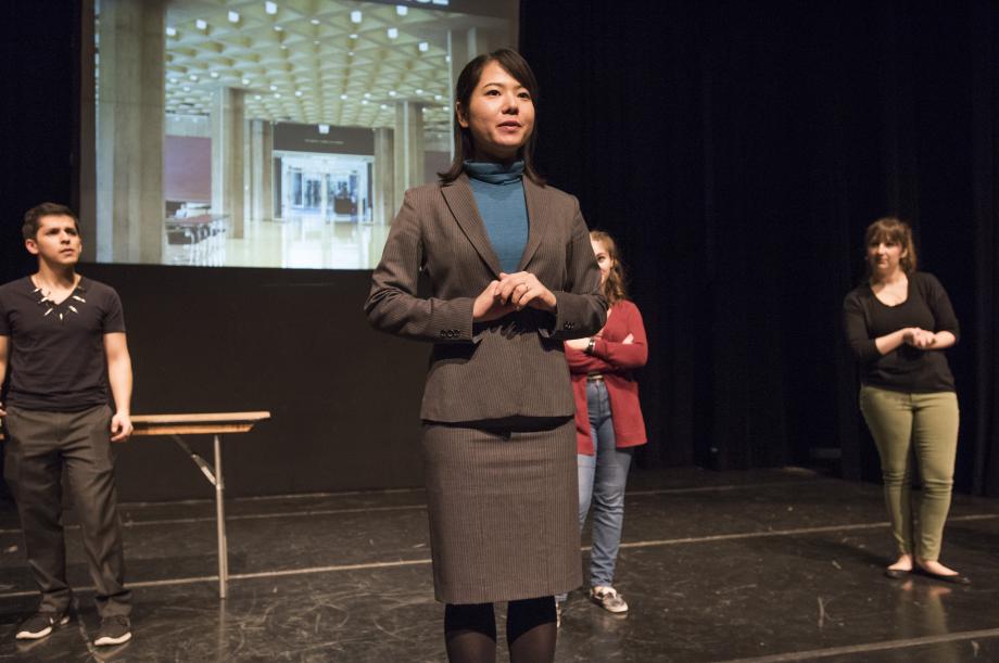 Professor Emily Buss (played by Yuki Matsumiya, LLM '19) auctions off the Privilege Stone.