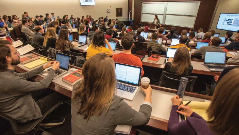 Lee Fennell in front of a full classroom