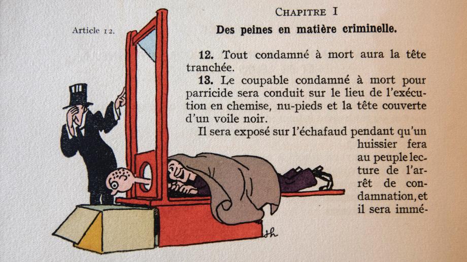 A man sticking a fake head through a guillotine with the executioner unaware