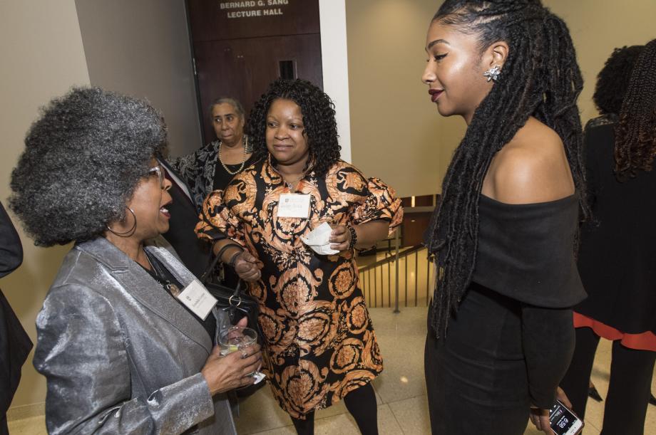 The event drew members of the judiciary, including Cook County Circuit Judges Erika Orr (center), seen talking with Professor Herschella Conyers and Savannah West, '20.