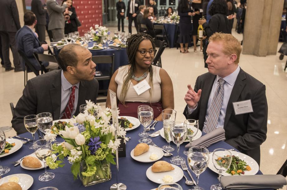 Daniel Jellins, '21, and Naphtalie Ukiri, '21, talked with Professor Jonathan Masur at dinner.