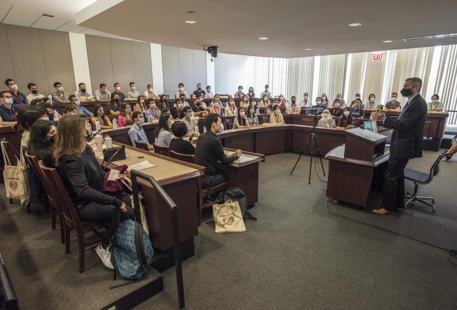In this photo, Dean Thomas J. Miles welcomes the LLM Class of 2022. 