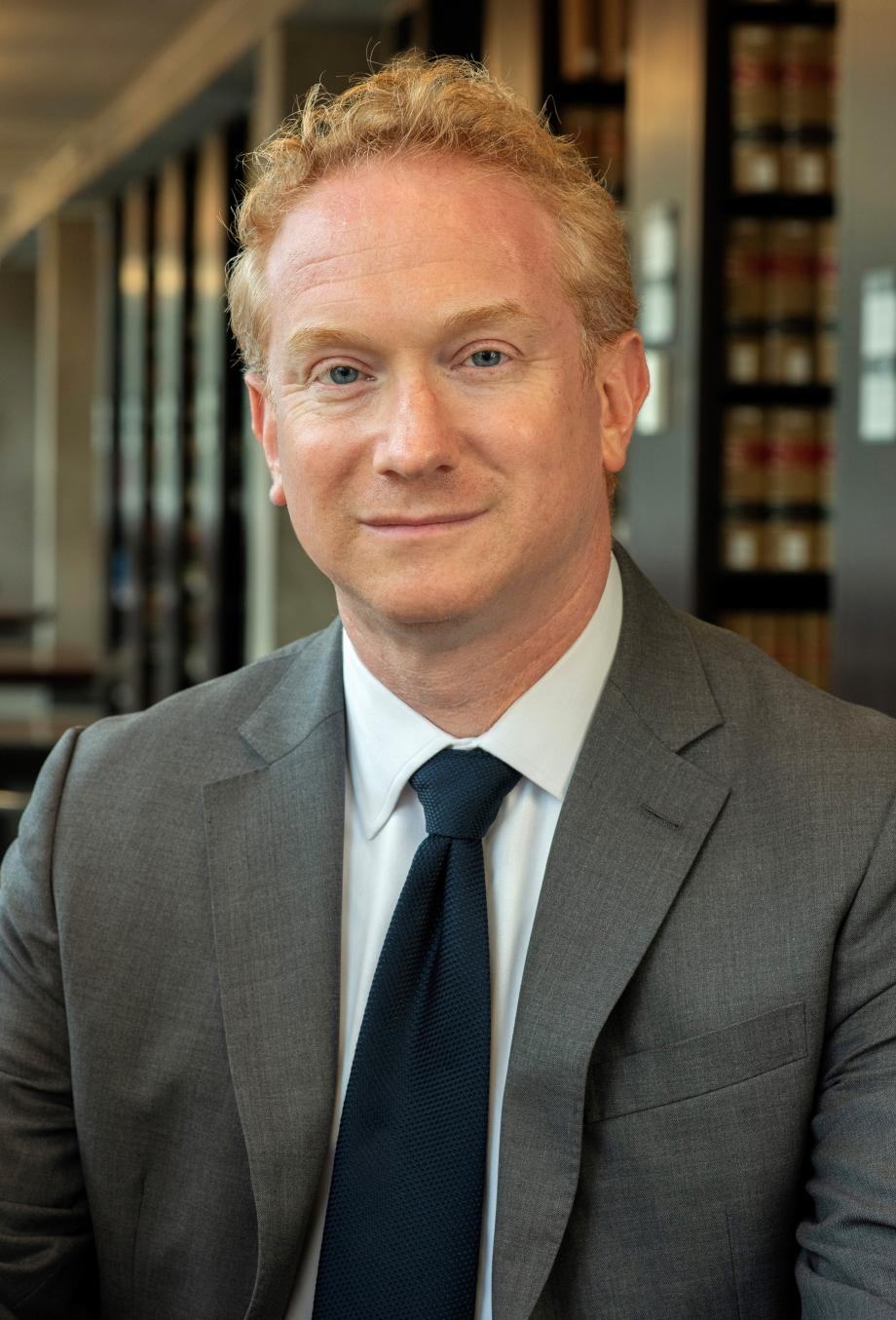 Full color photograph of Professor Jonathan Masur. 